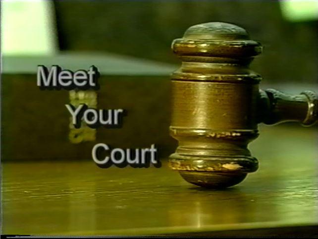 Meet Your Court text over image of wooden desk and gavel